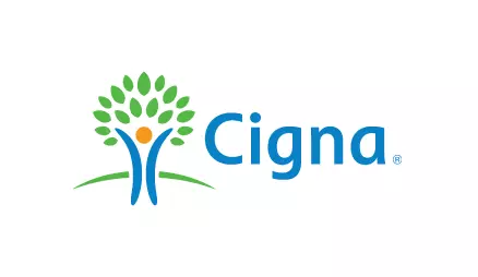 The image shows a logo with the text CIGNA prominently displayed, accompanied by a graphic element resembling a tree with leaves, set against a white background.